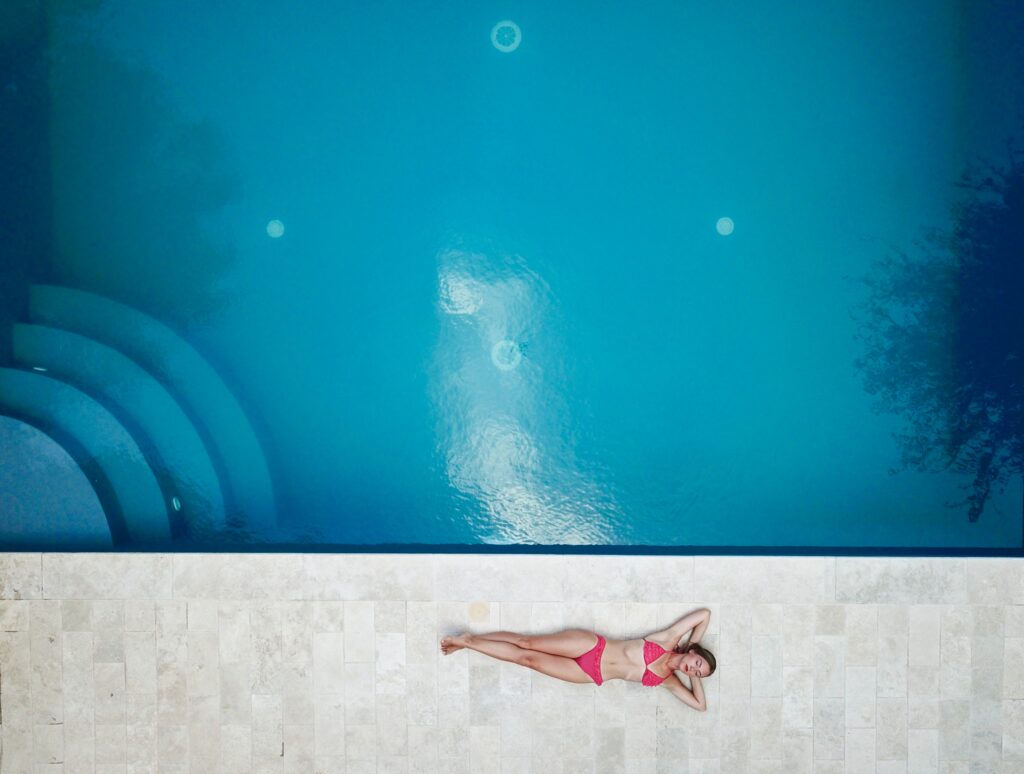 A woman relaxing in a swimming pool